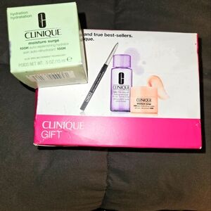 Clinique set that includes 2 Moisture Surges! Makeup remover and black eye penci